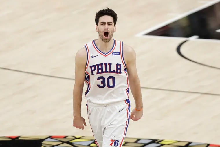 Sixers guard Furkan Korkmaz yelling after hitting a three-point basket against the Atlanta Hawks in the playoffs.