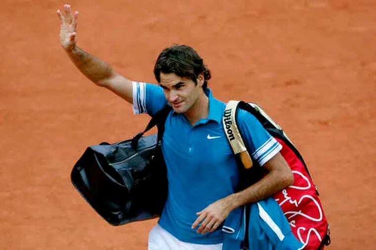 Roger Federer walks off the court following his quarterfinal loss in Paris. &quot;They all come to an end at some stage,&quot; Federer said of his Grand Slam streak. &quot;It was a great run,&quot;
