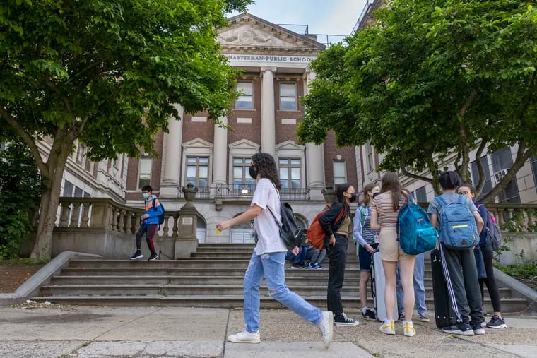 Students gather outside Masterman, one of the district's special admissions schools, in this May 2022 file photo.
