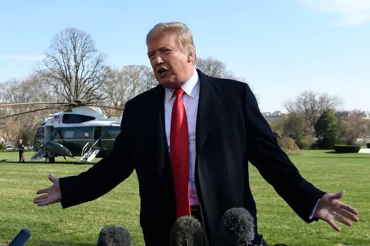 President Donald Trump talks with reporters before boarding Marine One on the South Lawn of the White House in Washington, Thursday, March 28, 2019, for the short trip to Andrews Air Force Base in Maryland. Trump is traveling to Michigan to speak at a rally before spending the weekend at his Mar-a-Lago estate in Florida.