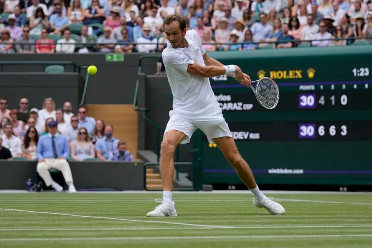 Russia's Daniil Medvedev, shown playing at Wimbledon in July 2021, is one of the players affected by the ban.