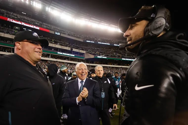 Eagles coach Nick Sirianni (right) with team owner Jeffrey Lurie (center) and security chief Dom DiSandro during the NFC championship game against the San Francisco 49ers on Jan. 29, 2023.