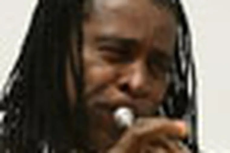 Trumpeter/composer Hannibal Lokumbe during rehearsal of "can You hear God Crying" at the Baptist Church,  Cheltenham Ave, Philadelphia September 10, 2012.  ( DAVID M WARREN / Staff Photographer )