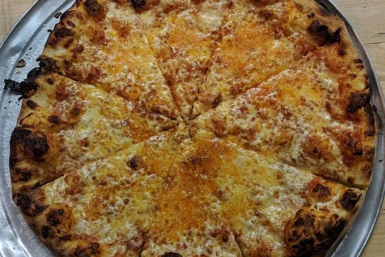 A round pizza made by Dan Gutter.