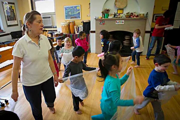 Ms. Martha Zook, music teacher works with Pre-K children at the Settlement Music School on 4th and Queen in Philadelphia on Tuesday, February 18, 2014. ( ALEJANDRO A. ALVAREZ / STAFF PHOTOGRAPHER )