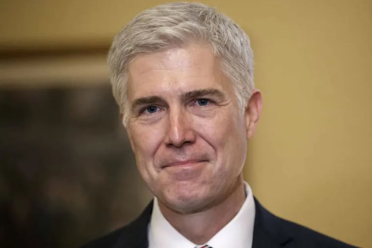 FILE - In this Feb. 1, 2017 file photo, Supreme Court Justice nominee, Neil Gorsuch is seen on Capitol Hill in Washington. Gorsuch has been a defender of free speech and a skeptic of libel claims, an Associated Press review of his rulings shows.