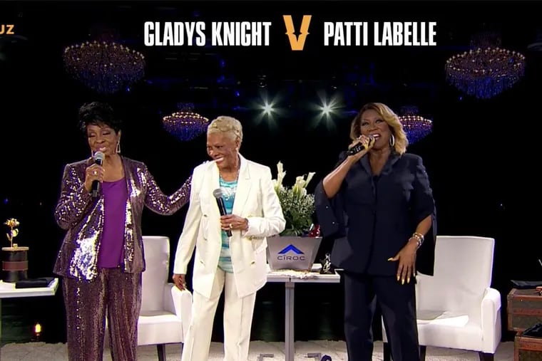From left, Gladys Knight, Dionne Warwick, and Patti LaBelle reunite on stage during a #Verzuz battle between Knight and LaBelle at the Fillmore Philadelphia.