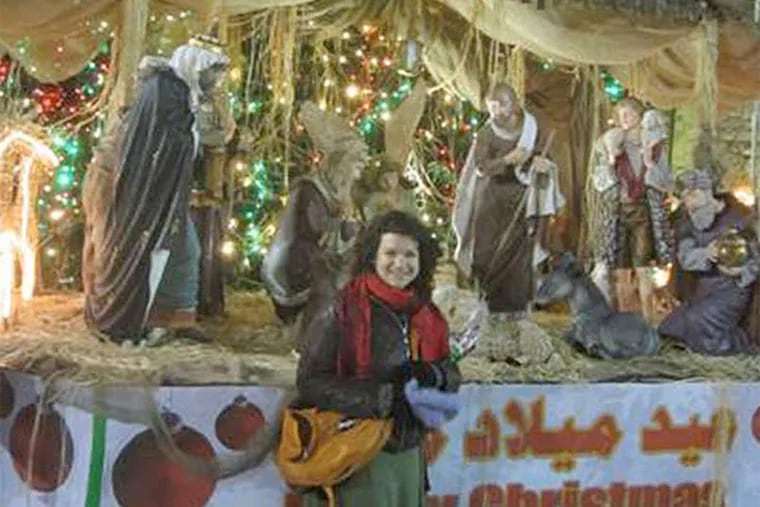 Writer Melanie Stanek in a chilly Manger Square in Bethlehem. On the spur of the moment, she walked there with a group from a Christmas Eve service at the Church of the Redeemer in Jerusalem.