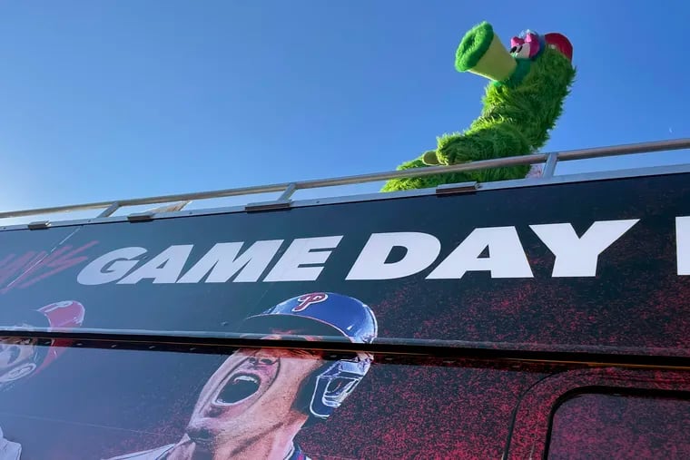 The Phanatic arriving in the parking lot at P.J. Whelihan’s in Westmont, N.J. atop the Rally for Red October Tour Bus, the first stop before heading to Center City ahead of the weekend’s NLCS games.