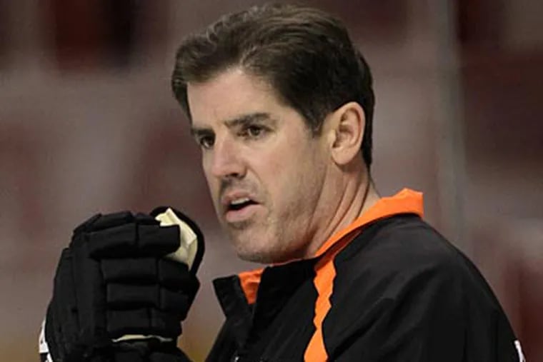 Peter Laviolette is cocoaching in the All-Star Game because the Flyers are atop the Eastern Conference. (AP file photo)