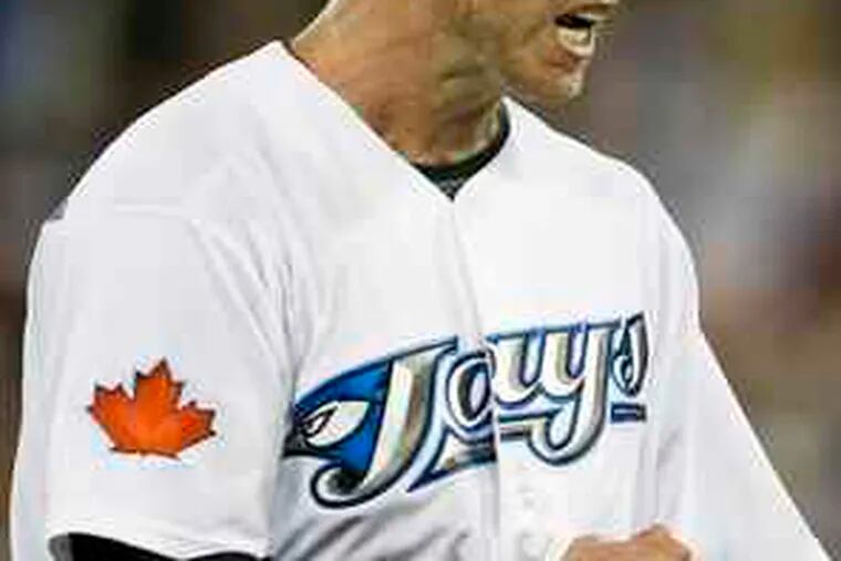 Toronto's Roy Halladay won his ninth game and struck out 14.