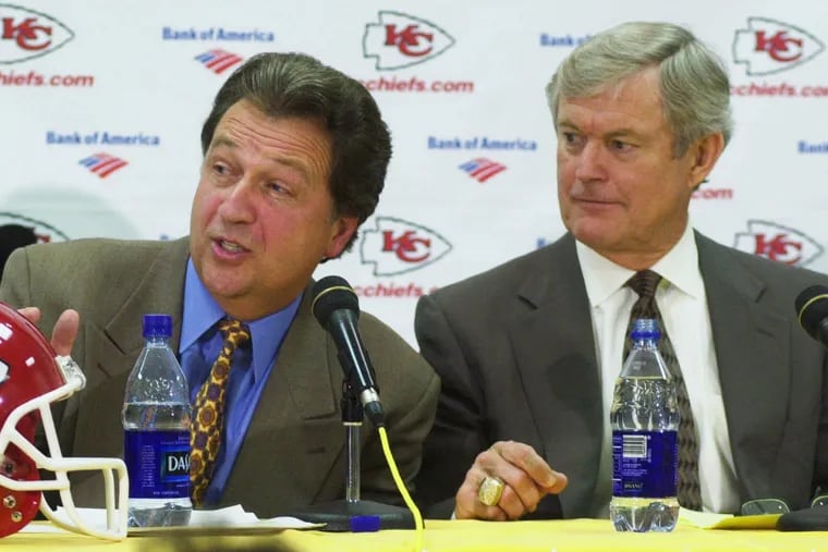 Kansas City Chiefs president and general manager Carl Peterson, left, and coach Dick Vermeil answer questions during a news conference at Arrowhead Stadium in Kansas City, Mo.,  on Jan. 12, 2001. Vermeil, who coached the St. Louis Rams to a Super Bowl championship, was hired by Peterson as head coach of the Chiefs, with a three-year deal worth a reported $10 million. (AP Photo/Orlin Wagner)