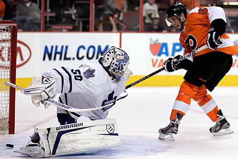 Tomas Hyka scored the Flyers' first goal on Maple Leafs goalie Jonas Gustavsson in the second period. (Tom Mihalek/AP)