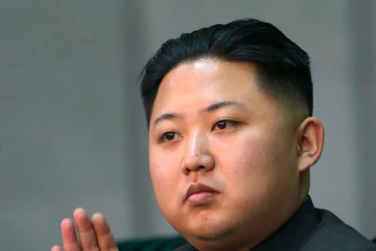 Kim Jong Un, third son of North Korean leader Kim Jong Il, applauds during a performance in Oct. 2010.