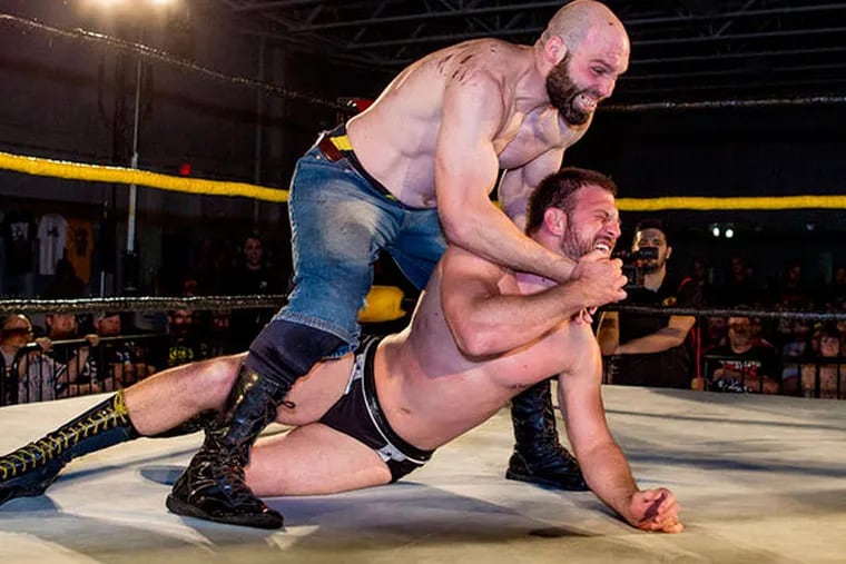 JEFF FUSCO / FOR THE DAILY NEWS Nick Gage (top) returned to the ring last weekend, in a match against Drew Gulak, after serving a four-year sentence for bank robbery.