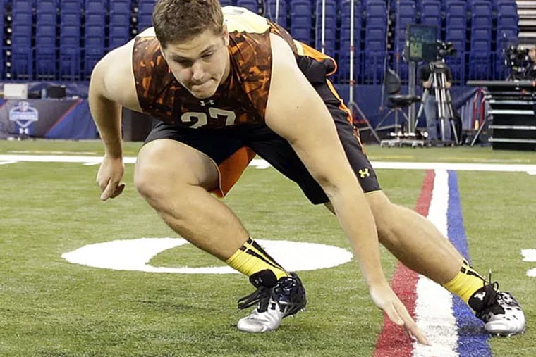 Texas A&M offensive lineman Luke Joeckel runs a drill during the NFL football scouting combine in Indianapolis, Saturday, Feb. 23, 2013. (AP Photo/Dave Martin)