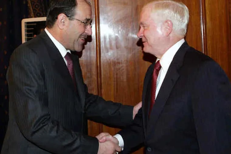 Iraqi Prime Minister Nouri al-Maliki (left) greets U.S. Defense Secretary Robert M. Gates, making a surprise trip to Baghdad.