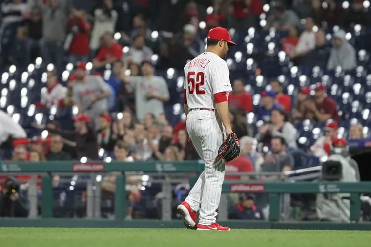 Pitcher Jose Alvarez of the Phillies walks off the field after giving up 4 runs in the 10th inning against the Nationals at Citizens Bank Park on April 9, 2019.