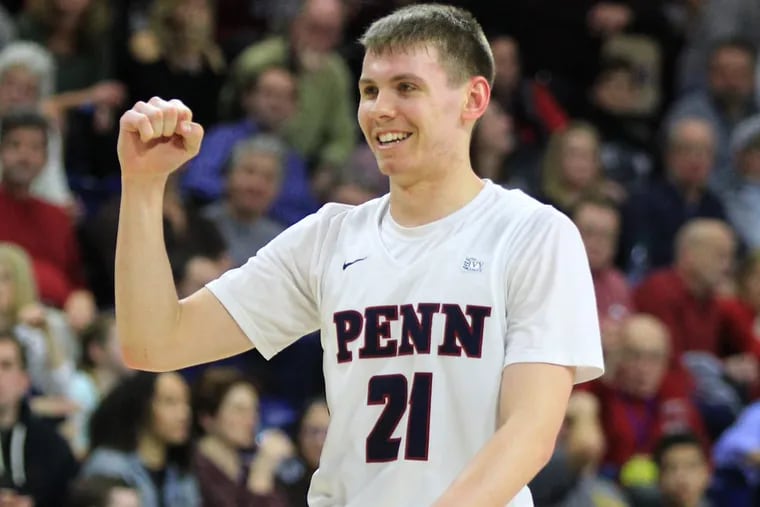 Penn’s Ryan Betley pumps his fist as Penn pulls away from St. Joseph’s late in the game at the Palestra on Jan 27.