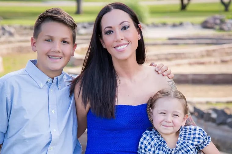 Jeanna Hoch, founder of CannaMama Clinic, with her son Jonathan, 13, and daughter Lillian, 5.