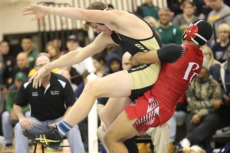 Tyreke Brown (right) of Penns Grove defeated Southern's J.T. Cornelius to win the 220-pound title at the Region 8 tournament at Egg Harbor Township.