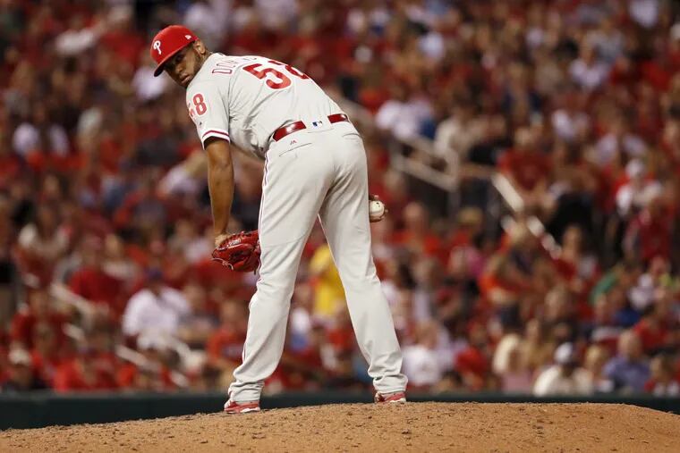 Phillies relief pitcher Seranthony Dominguez checks the runner on first during the seventh inning of the Phillies’ win on Thursday.