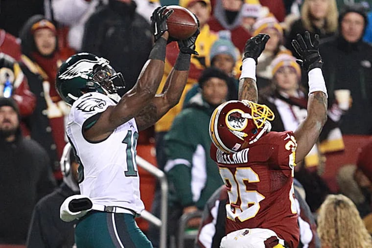 Eagles wide receiver Jeremy Maclin makes a reception as a Redskins cornerback defends. (Ron Cortes/Staff Photographer)