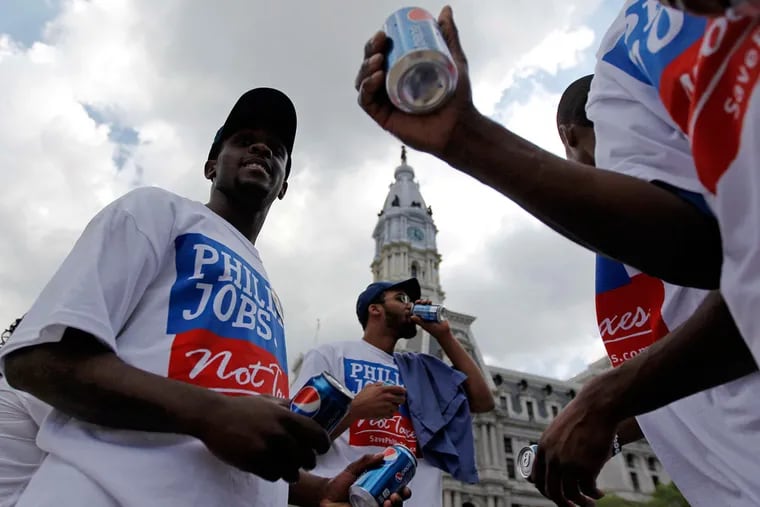Opponents of a proposed Philadelphia soda tax in 2011, when Michael Nutter was mayor, included union members who protested outside City Hall.