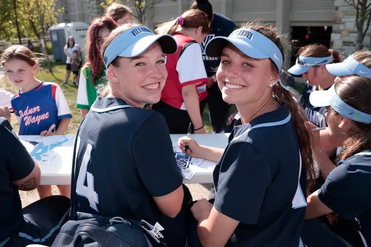 Brooklyn Ostrowski (left) and Madison Ostrowski are sisters who play on the Villanova University softball team.