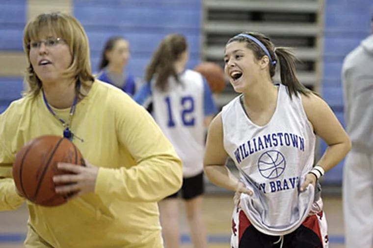 Williamstown girls' basketball head coach Karen Dilmore practices with her team back in December 2008. (Elizabeth Robertson / Staff Photographer)