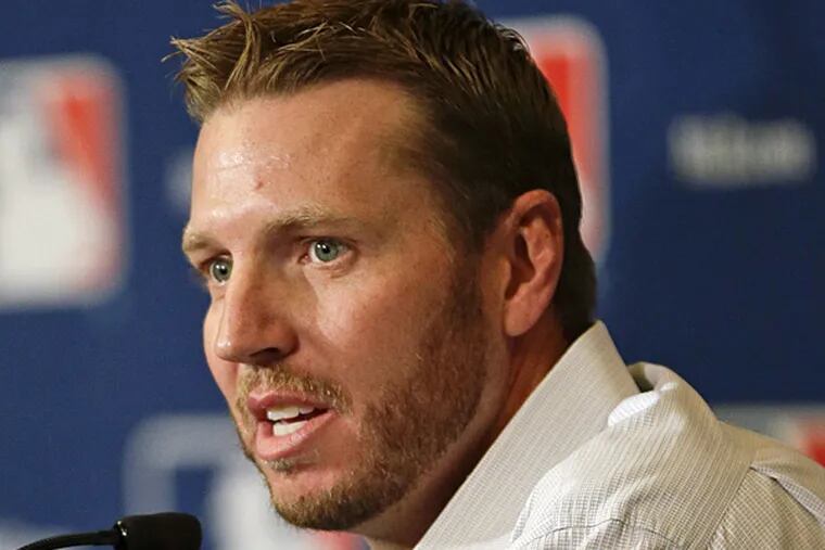 Two-time Cy Young Award winner Roy Halladay announced his retirement on Monday, Dec. 9, 2013. (John Raoux/AP)