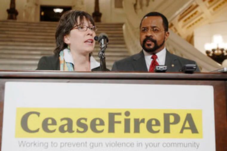 Calling for tighter gun-control laws, Diane Edbril of CeaseFire PA and State Rep. Jewell Williams speak in the Capitol. Williams said yesterday that he&#0039;d been threatened by an Allentown man.