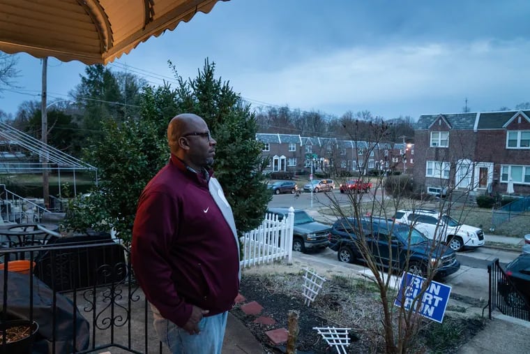 Marc Reason, president of the Overbrook Park Civic Association, shown on the front porch of his home Friday, March 15, 2019, says the community is “extremely concerned” about an uptick in violent crime.