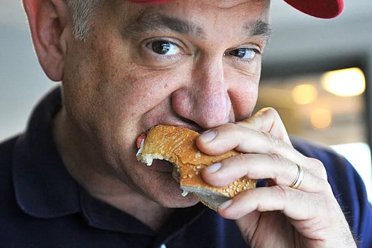 Glen Macnow sampling a Cosmi's hoagie in June 2009 at the WIP studio in  Bala Cynwyd. He elected not to include it in the 50-plus official reviews of his Great Hoagie Hunt.
