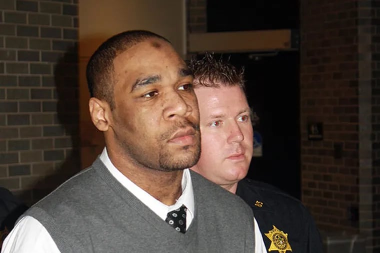 Omar Sharif Cash being led to his trial at the Bucks County Courthouse by sheriff's deputies on May 17, 2010. Cash was found guilty of first-degree murder on Thursday. (Larry King / Staff File Photo)