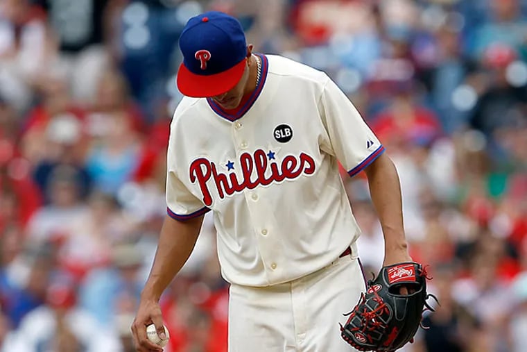 Phillies' pitcher Severino Gonzalez kicks the pitchers mound after
balking in a third-inning run against the San Francisco Giants on
Saturday, June 6, 2015 in Philadelphia.  (Yonh Kim/Staff
Photographer)