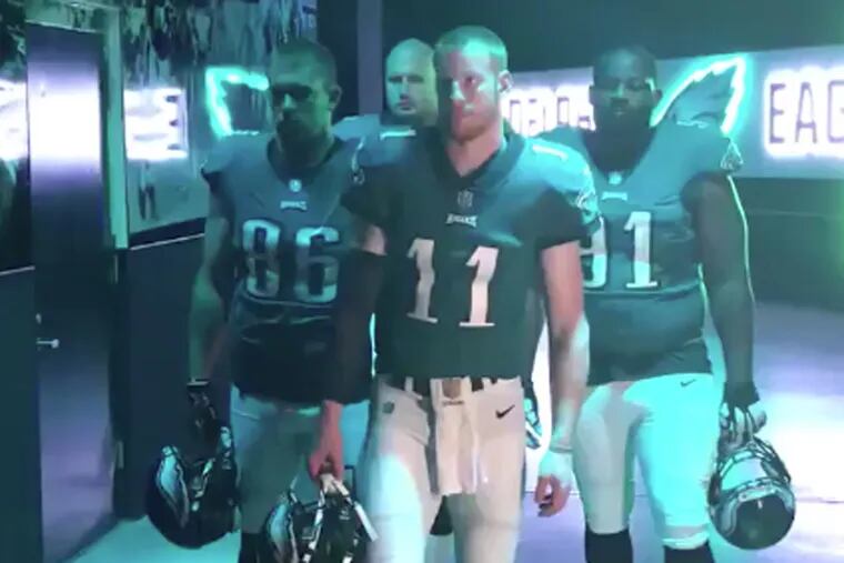 (From left to right) Eagles tight end Zach Ertz, offensive lineman Chris Long, quarterback Carson Wentz and defensive lineman Fletcher Cox film their segment for 'Sunday Night Football's' new opening.