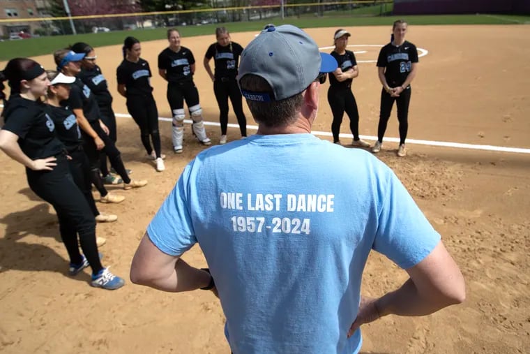 When Cabrini University announced last summer that it would close at the end of this academic year, the women's softball team roster dwindled from 20 players to nine, just like that. Most members who were underclassmen, left for other schools. But there were eight seniors left and they were determined to play. Two underclassmen agreed to join the team. The T-shirt of an assistant coach Steve Byrnes indicates the final season for the college team during the double header against Penn State Brandywine on April 16, 2024f
