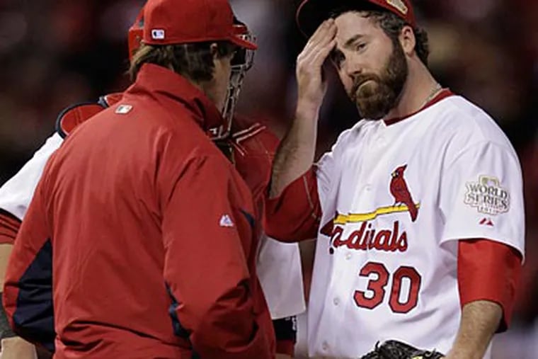 Cardinals closer Jason Motte reacts as Tony La Russa takes him out of Game 2 of the World Series. (Charlie Riedel/AP)