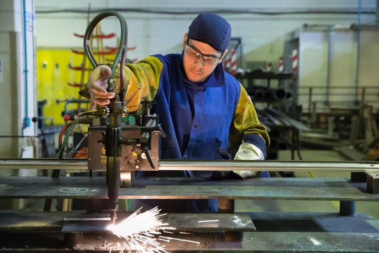 Julio Rivera welds during class at Edison High school, Wednesday, February 01, 2017.