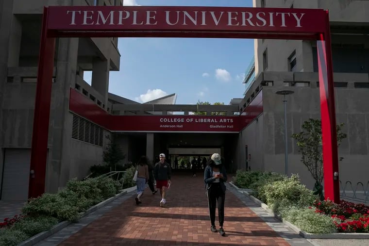 Students walk through the campus of Temple University in Philadelphia in October.