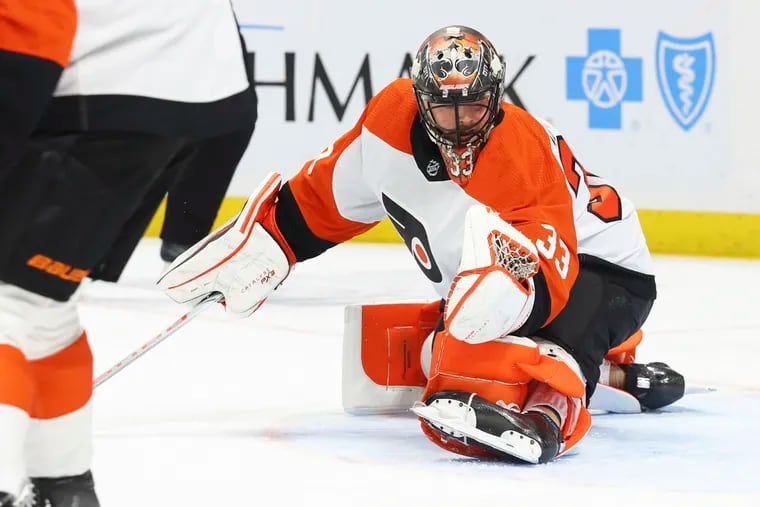 Flyers goaltender Samuel Ersson (33) makes a glove save during the first period Friday against the Buffalo Sabres.