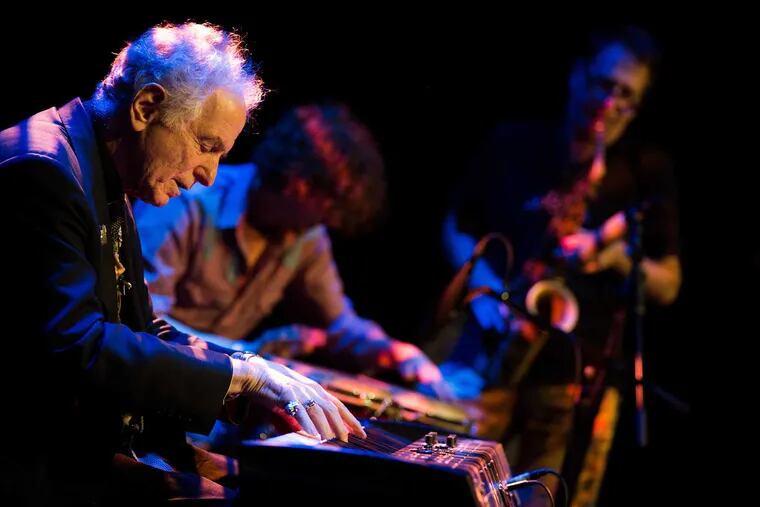 David Amram improving in concert on the keyboard. A celebration of his chamber music happens Wednesday at the Trinity Center for Urban Life.