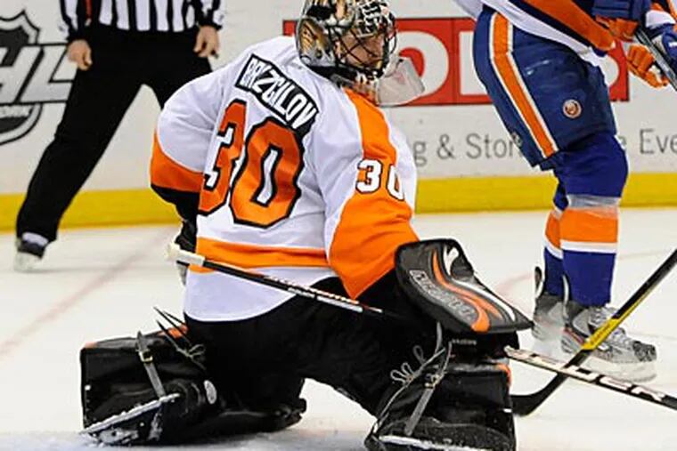 Flyers goalie Ilya Bryzgalov set a new franchise record for consecutive scoreless minutes on Thursday night. (Kathy Kmonicek/AP)