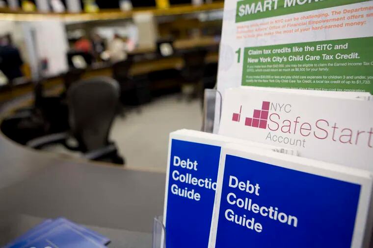 A debt collection guide on display as part of the launch of a financial literacy center at a New York Public Library branch.