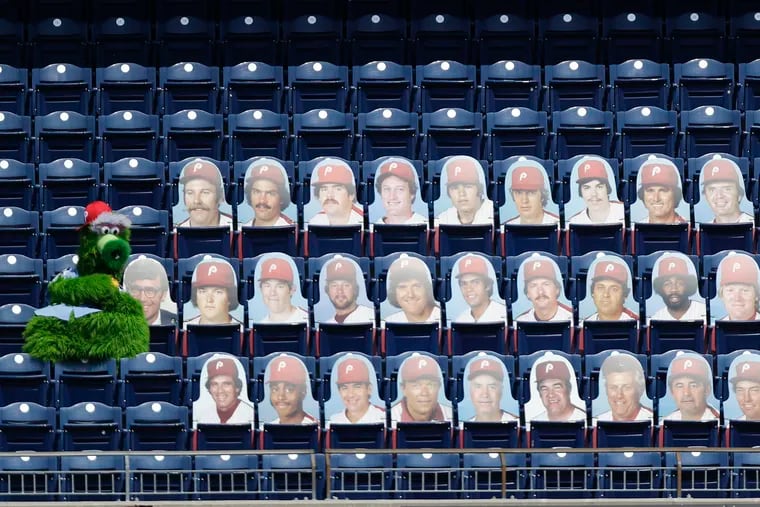 The Phillie Phanatic sat next to cardboard images of the 1980 Phillies World Series championship team last August. The COVID-19 pandemic prevented the Phillies from having a 40-year reunion, and it will not take place this season, either.