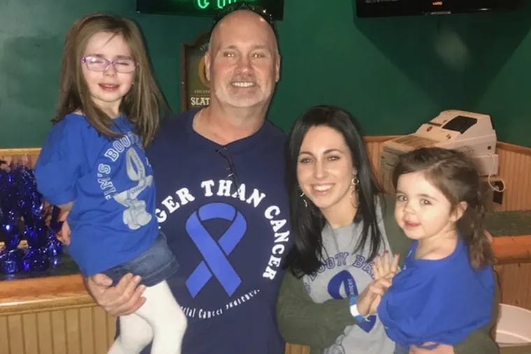 Mr. Dowling stands with his daughter, Brigid, and two of his four grandchildren. "He taught me to never be afraid to speak my mind and to use my voice to stand up for others," his daughter said.
