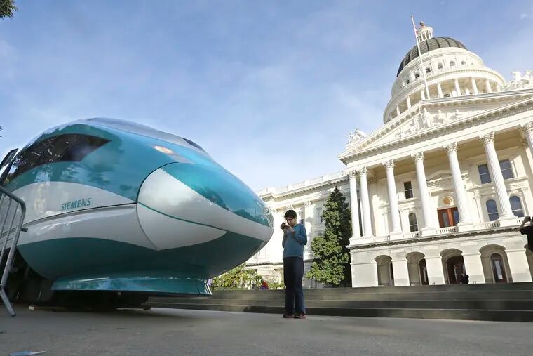 FILE - In this Feb. 26, 2015, file photo, a full-scale mock-up of a high-speed train is displayed at the Capitol in Sacramento, Calif. The Trump administration canceled nearly $1 billion in federal money for California's high-speed rail project Thursday, May 16, 2019, further throwing into question the future of the ambitious plan to connect Los Angeles and San Francisco.