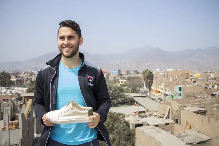 Fernando Rojo, founder of Patos and a new University of Pennsyvlania graduate, with one of his sneakers, handcrafted in Peru.