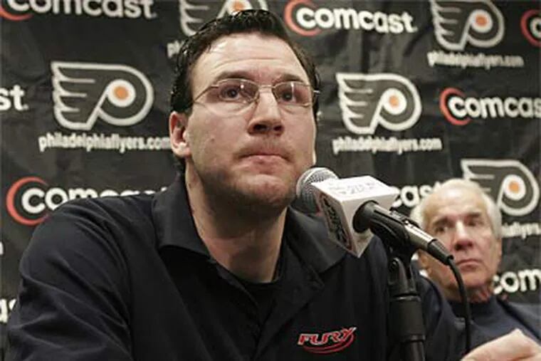 Retired Flyer Keith Primeau said he still suffers from concussion symptoms. (David M. Warren / Staff Photographer)